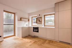 Erstbezug nach Sanierung | 2 Zimmer Designwohnung mit 40 qm Sonnenterrasse im Grünen 