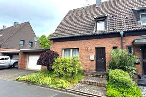 Doppelhaushälfte mit viel Potenzial, großem Garten und Garage an den Rheinwiesen 