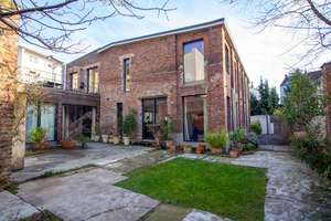 Stylish Loft Apartment with Private Garden in a Discreet Courtyard Setting