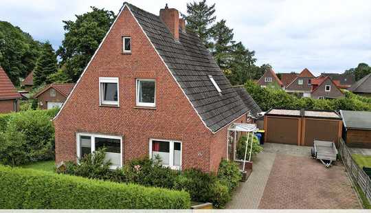 Bild von Gepflegtes Zuhause mit Garten und Doppelgarage