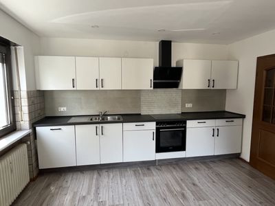 Attraktive Wohnung (Hochparterre) mit großem Balkon