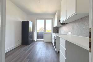 Umfassend sanierte Wohnung mit moderner Einbauküche, Balkon & hochwertigem Duschbad