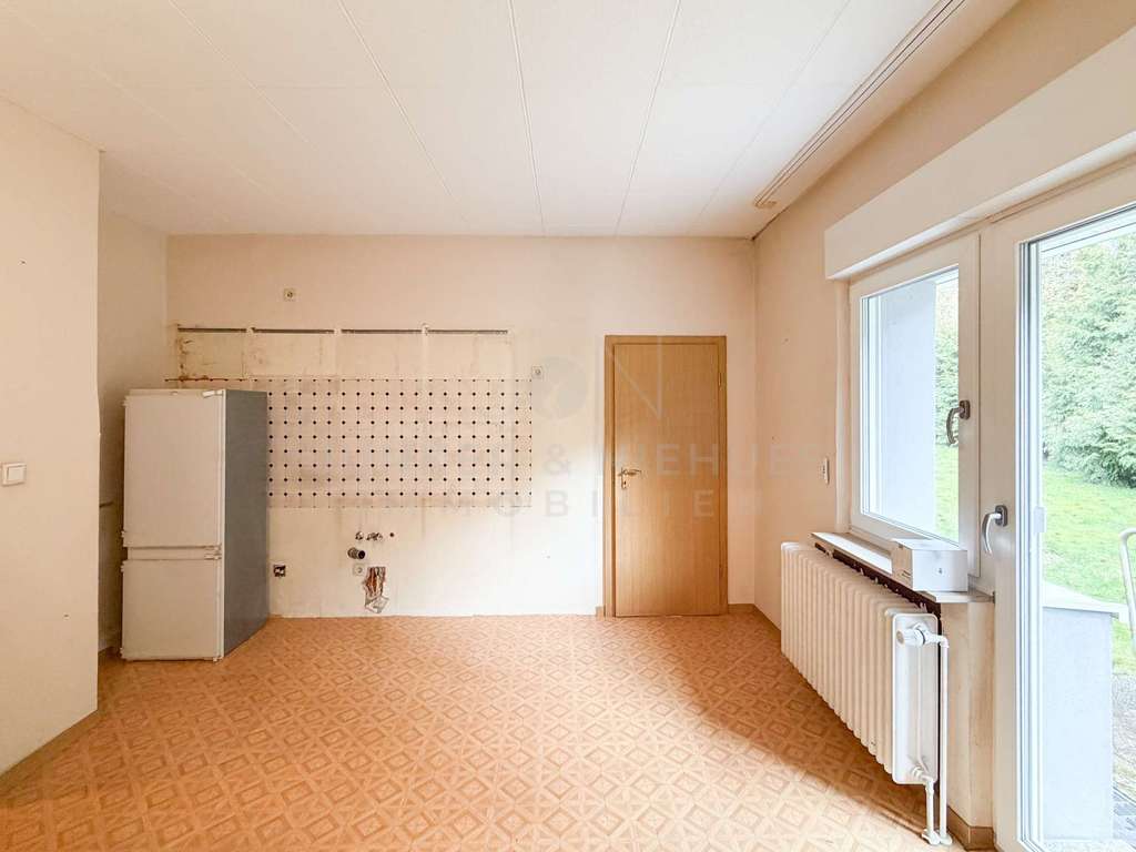 Immobilie in Steinhagen - Großes Grundstück in Steinhagen: Einfamilienhaus mit viel Potenzial für Ihre Wohnträume - Bild 4