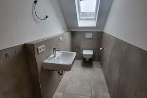 Modernes Wohnen auf zwei Ebenen – klimatisierte 4-Zimmer-Maisonettewohnung mit EBK und Südbalkon – Meinstraße 4a, 38448 Vorsfelde, Wolfsburg – Vorschaubild 10