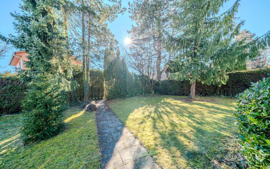 Immobilie in Straßlach-Dingharting - Großzügige Doppelhaushälfte mit Garten und viel Privatsphäre - Bild 1