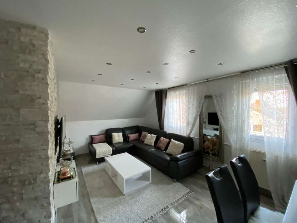 Immobilie in Raunheim - Gepflegtes Mehrfamilienhaus mit integrierter Gewerbefläche und weiterem Entwicklungspotenzial - Bild 4