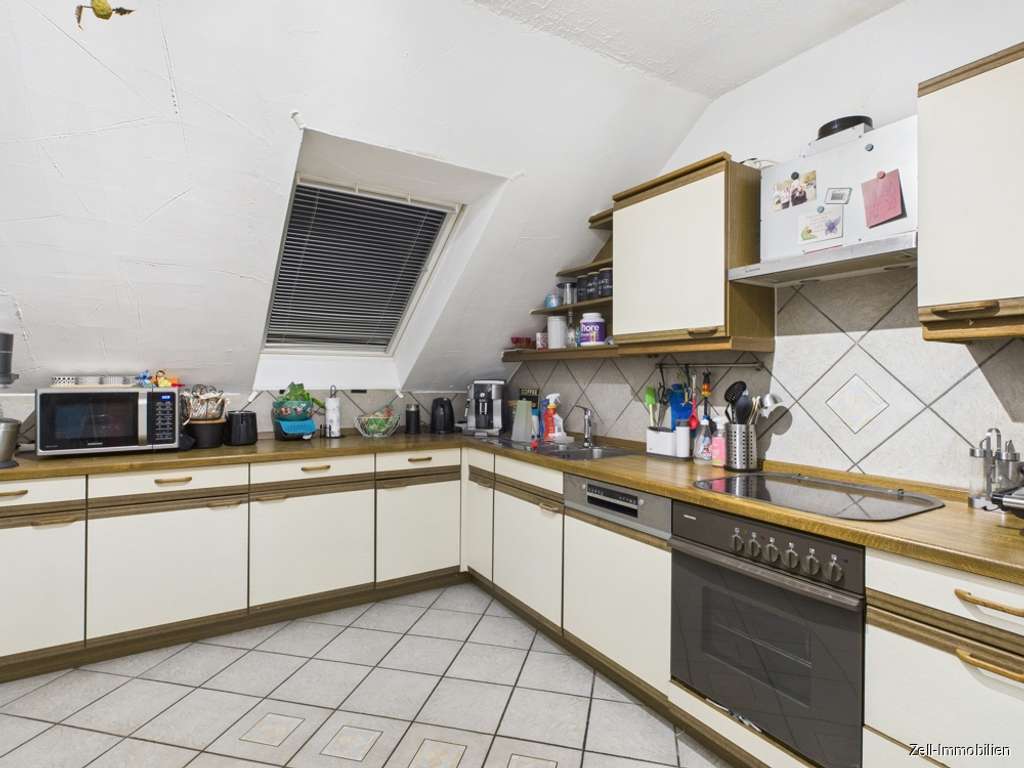 Immobilie in Oestrich-Winkel - Großzügige Dachgeschosswohnung in Oestrich zu verkaufen - Bild 3