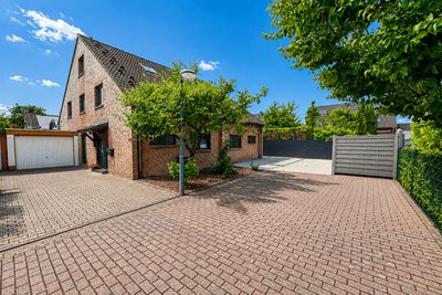 Ein Zuhause zum Ankommen – modernisierte DHH in familienfreundlicher Bestlage von Langenfeld