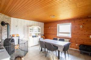 Wohnen mit Charme: Barrierearmer Holzbungalow mit Kamin und überdachter Terrasse – Die vollständige Adresse der Immobilie erhältst du vom Anbieter., 26532 Großheide – Vorschaubild 4