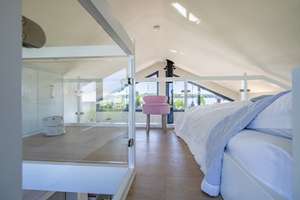 Design-Ferienhaus mit Sauna, Kamin & Wasserblick – Die vollständige Adresse der Immobilie erhältst du vom Anbieter., 23570 Travemünde, Lübeck – Vorschaubild 8