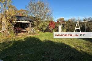 IMMOBERLIN.DE - Hübscher Gartenbungalow auf Eigenland in Tiergartensiedlung Oranienburg