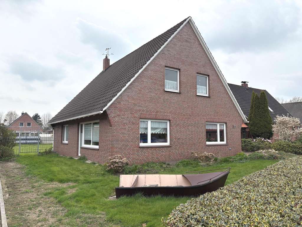 Immobilie in Ihlow - Gepflegtes Einfamilienhaus mit Garage in schöner Wohnlage von Ihlow; Ortsteil Riepe - Bild 1