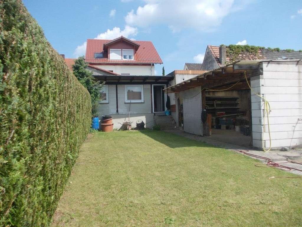 Immobilie in St. Leon-Rot - Reduzierung! 2-3 Familienhaus mit zusätzlicher Büroeinheit, Wintergarten, Garagen und Garten - Bild 4