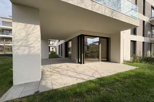 Lichtdurchflutete Gartenwohnung mit überdachter Terrasse
