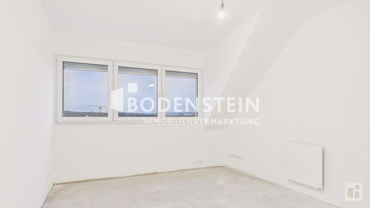 Immobilie in Nieder-Olm - Hochwertiges Stadthaus im KfW-40-Plus-Standard in zentraler Lage von Nieder-Olm - Bild 3