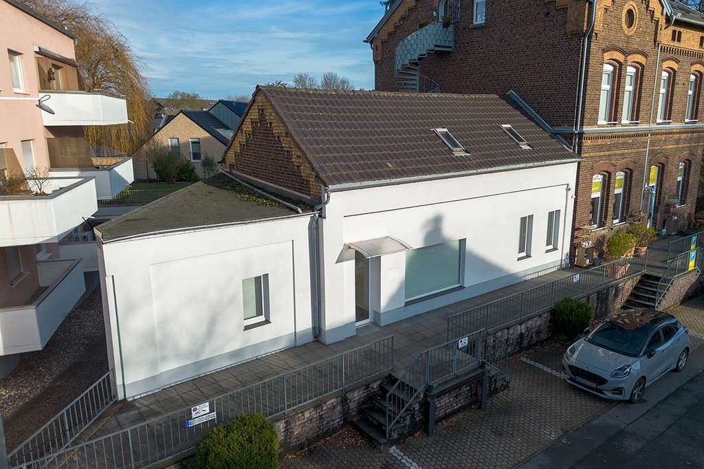 Immobilie in Pulheim - Helle und außergewöhnliche Wohneinheit mit 2 Stellplätzen und sonniger Terrasse (ohne Garten) - Bild 1