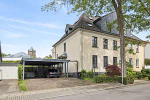 Altbauflair und Gartenidylle treffen modernes Familienleben