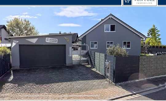 Familienfreundliches Einfamilienhaus mit Doppelgarage und schöner Außenanlage