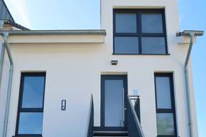 Sehr schöne Maisonette-Wohnung mit Galerie und Privatgarten zur Erstvermietung.