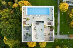 Urbaner Frühling über Bogenhausen. Urbanes Penthouse & Pool mit Weitblick.