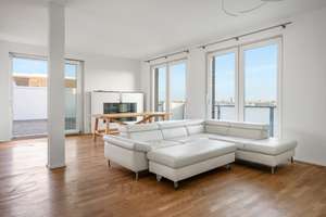 Exklusive Dachgeschosswohnung mit Skylineblick, großzügigem Wohnambiente – ruhig gelegen am Riedberg