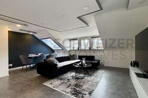 Modernisierte 2,5-Zimmer-Wohnung mit Balkon, Garage und Vermietung – attraktive Kapitalanlage