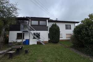 Einfamilienhaus mit großer Kellerwerkstatt am Ortsrand - – Die vollständige Adresse der Immobilie erhältst du vom Anbieter., 66629 Freisen – Vorschaubild 2