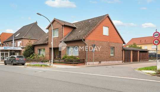 Bild von Einfamilienhaus mit Garagen & Nebengebäude - Terrasse sowie Nutz-Garten