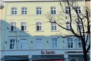 Exklusive Dachgeschosswohnung mit Balkon, Einbauküche, Kamin u. hochwertiger Ausstattung 