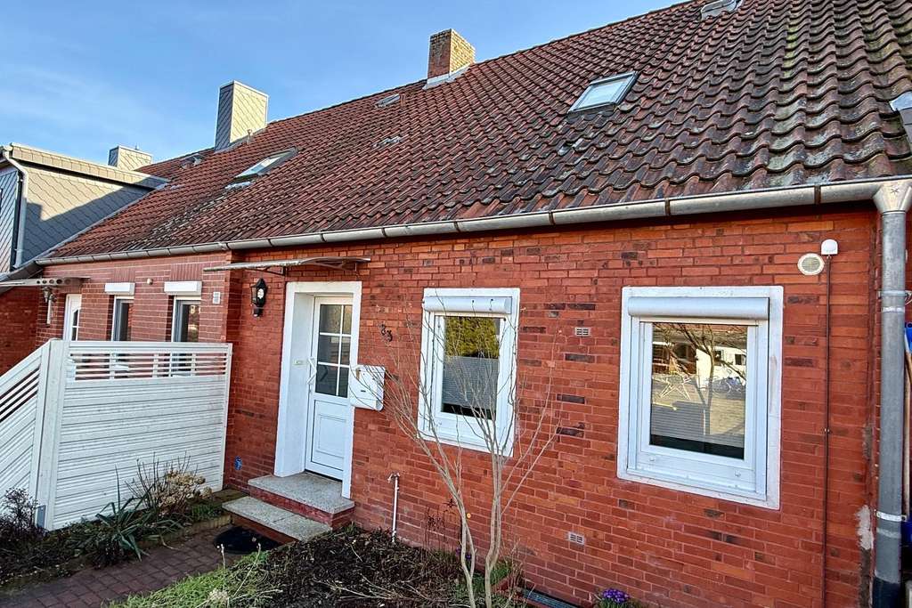 Immobilie in Scheeßel - Scheeßel - Charmantes Reihenmittelhaus mit Garage, Gartenpotenzial! - Bild 1