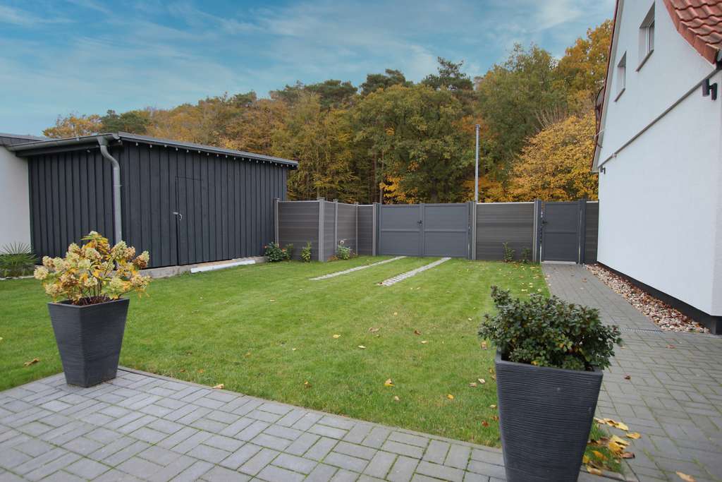 Immobilie in Ribnitz-Damgarten - einzugsfertige, moderne Doppelhaushälfte mit familienfreundlich angelegtem Garten - Bild 4