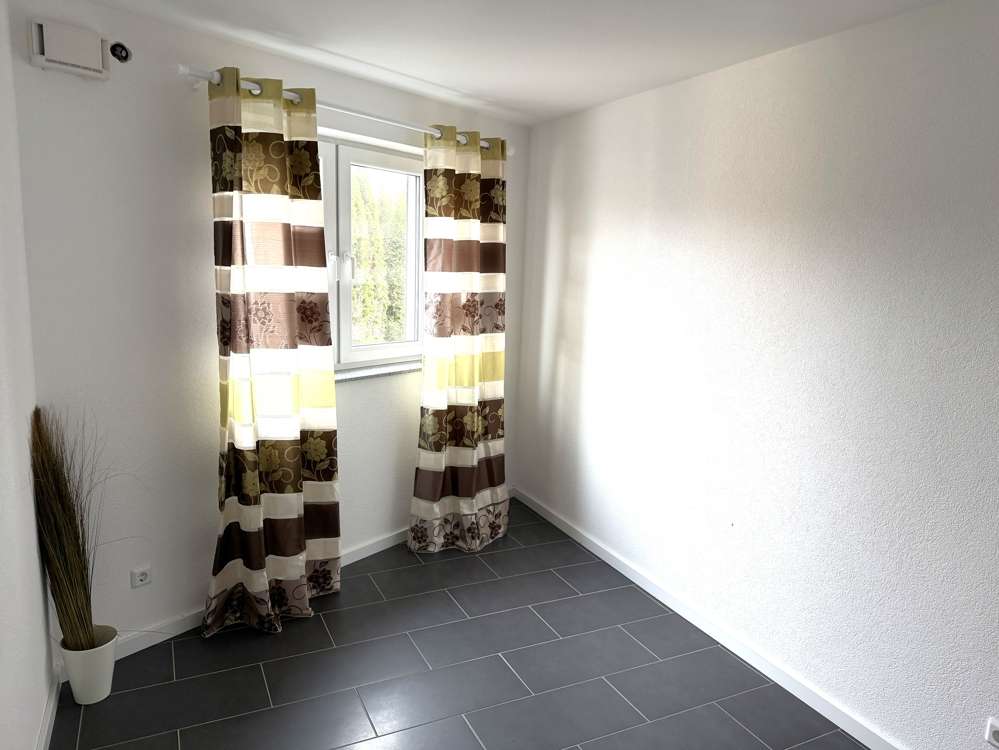 Immobilie in Mertesheim - Frische Luft, freier Blick, hoher Wohnkomfort = Lebensqualität! Modernes EFH m. ELW in Mertesheim! - Bild 17