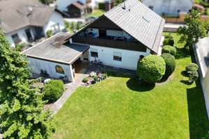 "Zwei unter einem Dach" schafft dieses Einfamilienhaus mit Einliegerwohnung und Garten – Die vollständige Adresse der Immobilie erhältst du vom Anbieter., 86830 Schwabmünchen – Vorschaubild 1