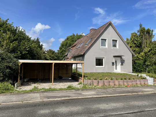 Gemütliche Single-Wohnung mit Gartenanteil und Carport im 2-Familienhaus (Römbke Immobilien KG)