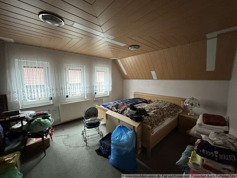 Immobilie in Apen - solides Klinkergebäude mit Garage und Wintergarten in Apen - Bild 4