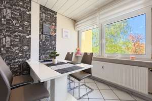 Wohnen mit Blick ins Grüne – gepflegte 3-Zimmer-Wohnung mit beheiztem Wintergarten