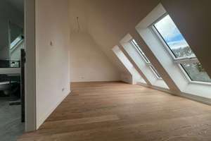QQI: 3- Zimmer Dachgeschoss-Maisonette im Münchner Süden