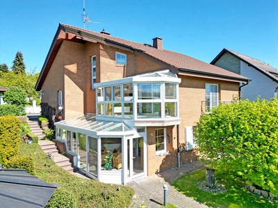 Komfort-Klinkerhaus auf über 1.600 m² Traumgrundstück in reizvoller Fernblicklage von Elgershausen