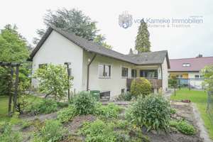 Großzügiger Bungalow mit Garten, Einliegerwohnung sowie Garage in herrlich ruhiger Lage 