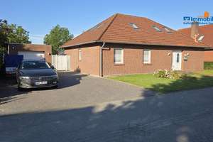 Moderner Bungalow mit viel Platz am Tief in Dornum - zeitnah verfügbar – Die vollständige Adresse der Immobilie erhältst du vom Anbieter., 26553 Dornum – Vorschaubild 1