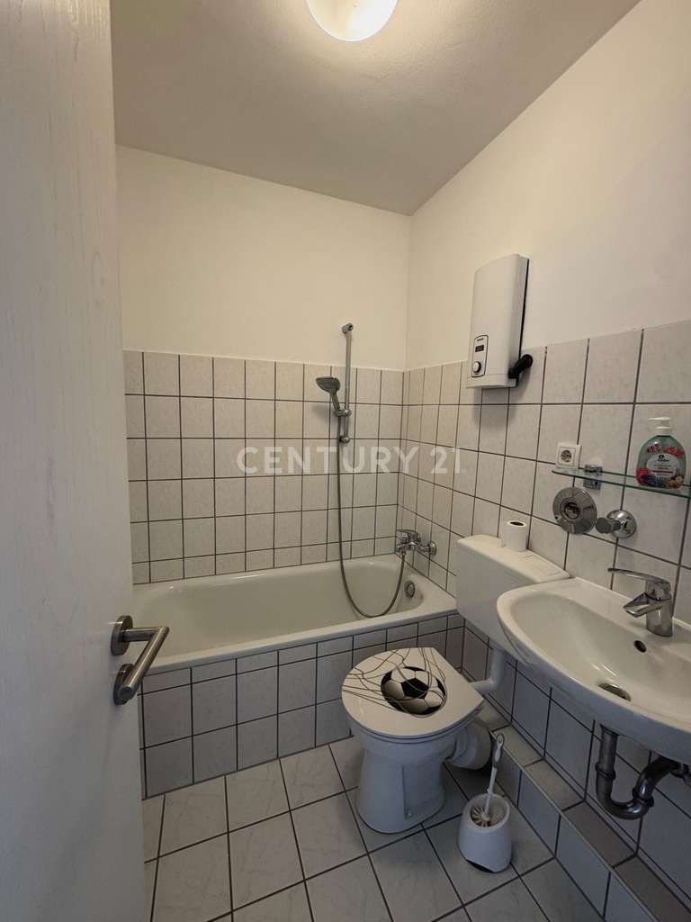 Immobilie in Flörsheim - Koffer packen und einziehen! Renovierte 2-Zimmer-Wohnung in ruhiger Lage - Bild 4