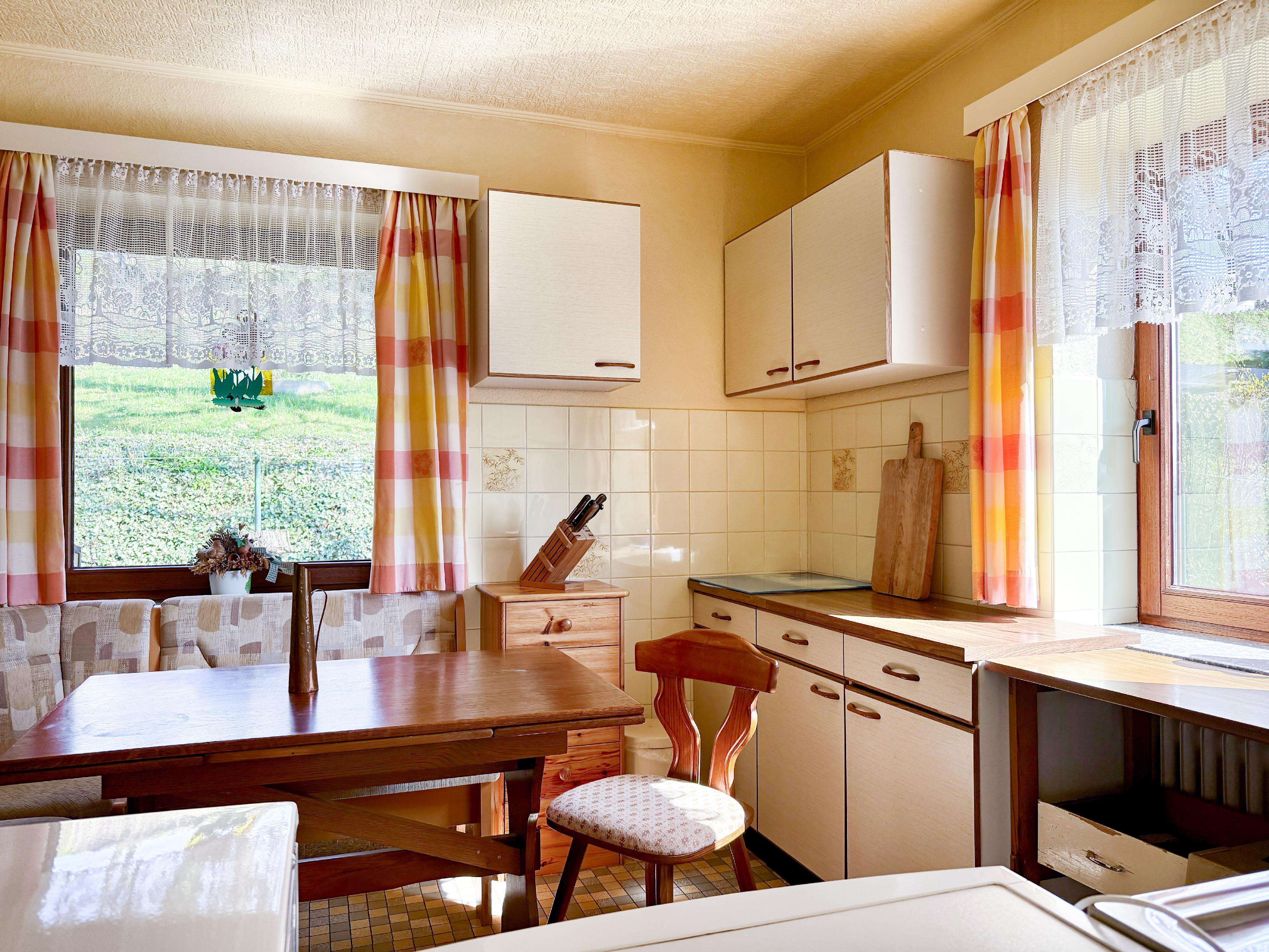 Immobilie in Bosau - Lage mit Aussicht - Älteres Familienhaus mit Gestaltungsspielraum - Bild 1