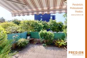Unterrath: Gut geschnittene Wohnung mit schöner Süd-Terrasse, Einbauküche und Tiefgaragenstellplatz!