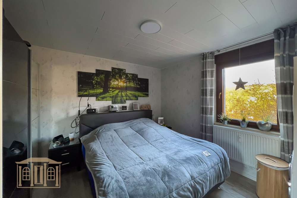 Immobilie in Lüdenscheid - Stilvoll modernisiert: Gemütliche Wohnung mit Kamin, Erker und Garten an der Volme - Bild 4