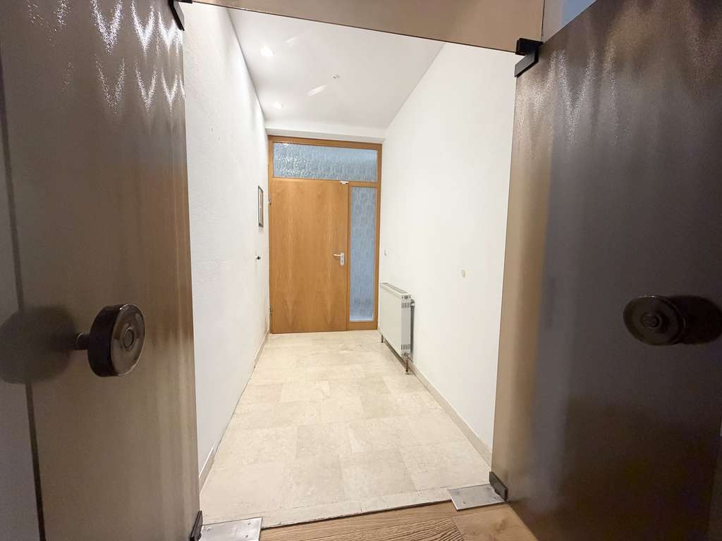 Immobilie in Hagenbach - Großzügige 3-Zimmer-Eigentumswohnung mit Kamin, Terrasse & Garage in ruhiger Hausstruktur - Bild 1