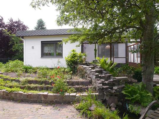 Bungalow mit Einliegerwohnung, Ausbaureserve und großem Garten in Rudow - Bild 21