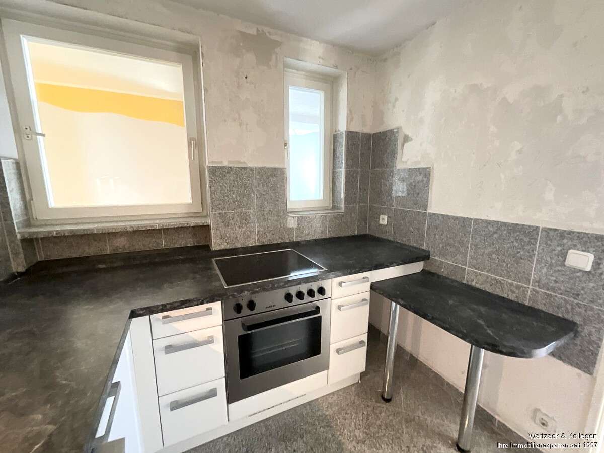 Immobilie in Schwaig bei Nürnberg - Über den Dächern von Schwaig - 3-Zimmer-Wohnung mit Ausblick, Balkon, Einbauküche und Garage - Bild 3