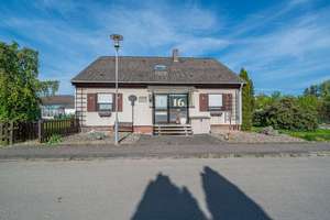 Charmant! Einfamilienhaus mit schönem Garten in ruhiger Lage