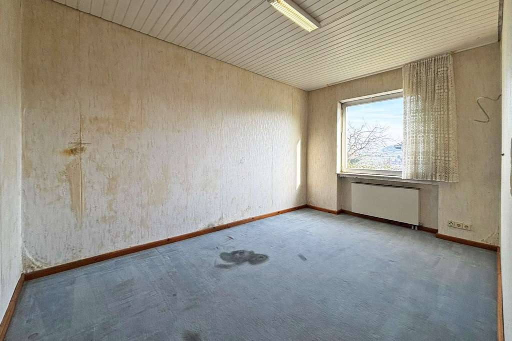 Immobilie in Newel - sanierungsbedürftiges Einfamilienhaus in Butzweiler mit ca. 146 m² Wohnfläche + Garage + Garten! - Bild 3