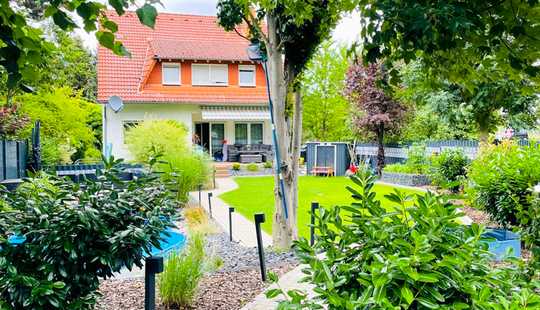 Bild von Wohnen und investieren: Eigene Wohnung mit Garten plus vermietete Einheiten für stabile Rendite